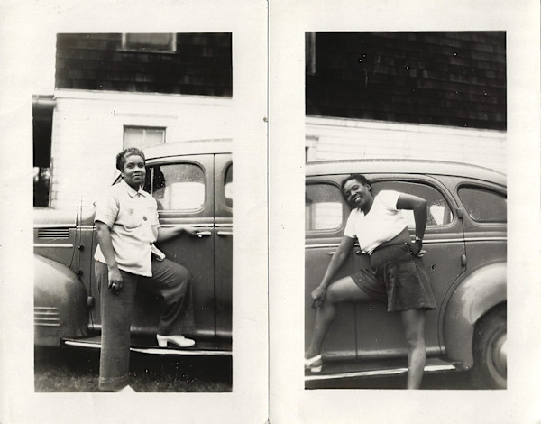 Women posing with car by Unknown