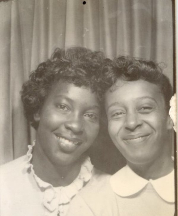 Two smiling young women by Unknown