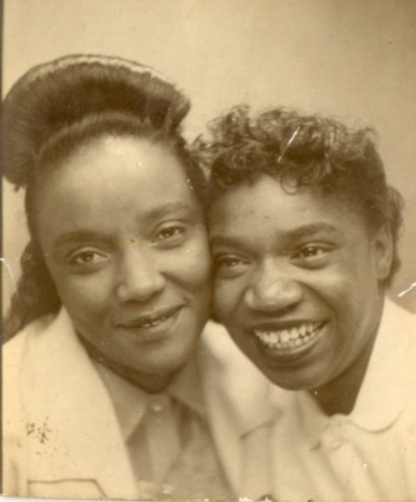 Two affectionate young women by Unknown