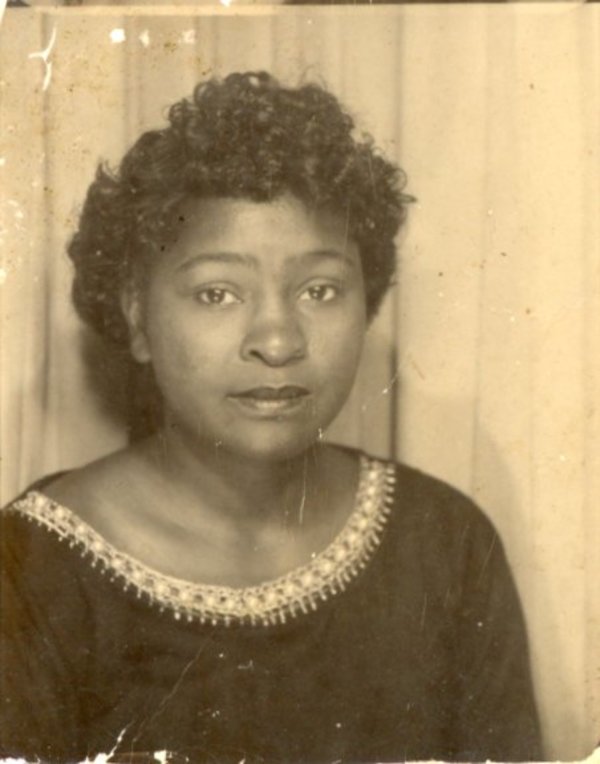 Serious woman by Unknown