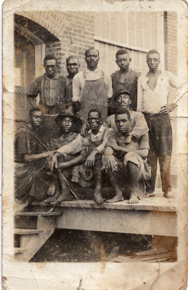Group of workers by Unknown