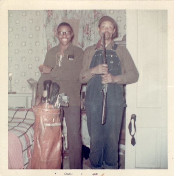 Guns & golf by Unknown