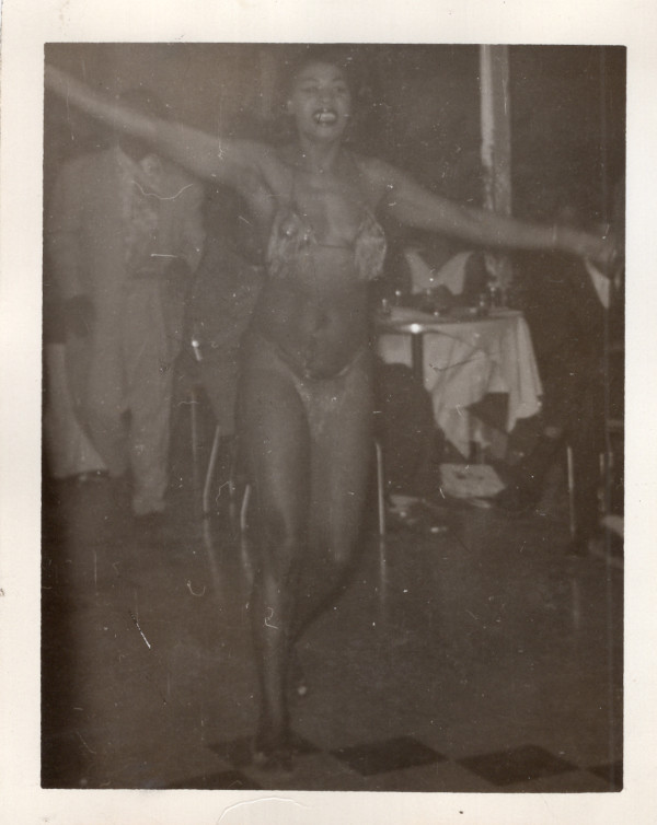 Burlesque dancer in floor show by Unknown