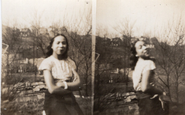 Woman posing and vamping outside by Unknown