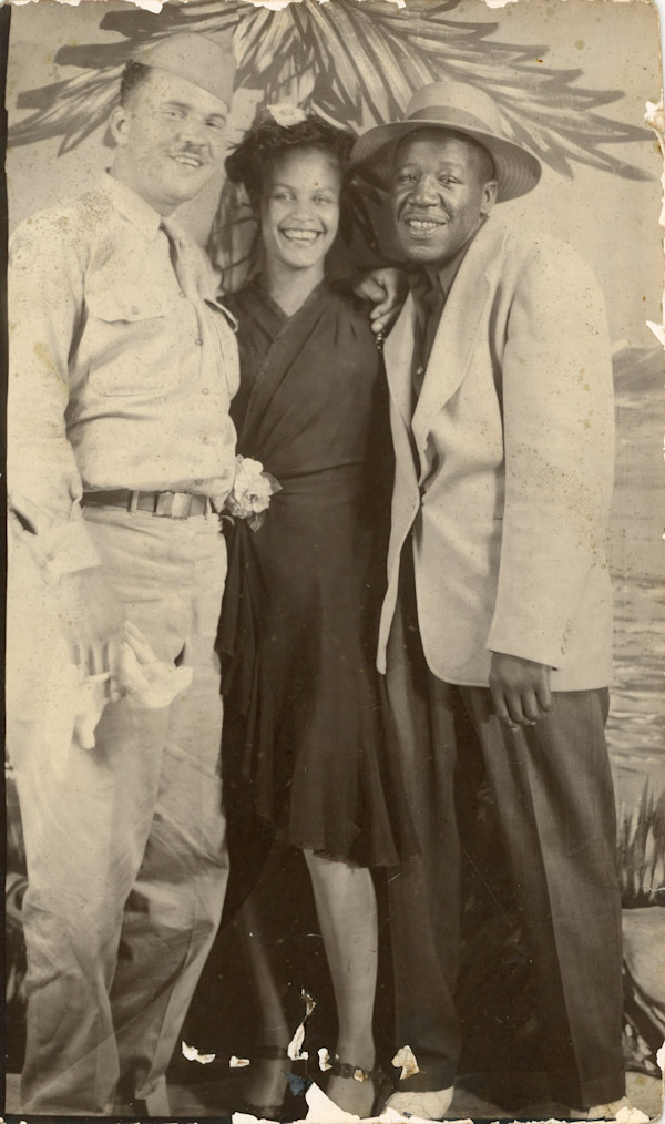 Arcade portrait of woman with a soldier & a civilian by Unknown