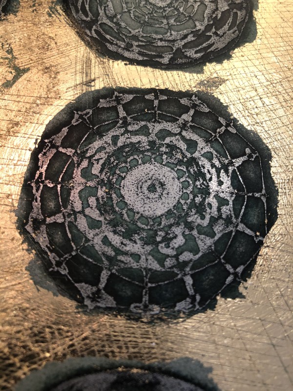 Esma on metal with gold leaf