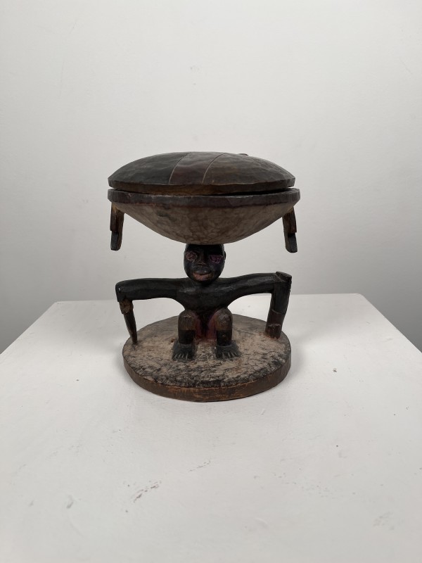 Wooden Vessel with Sculpted Man Base