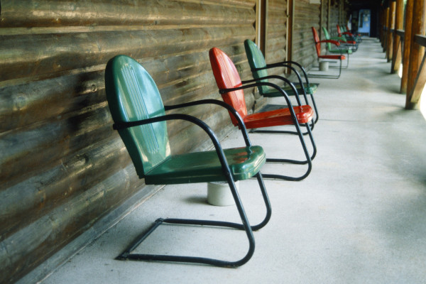 Metal Chairs on Porch by Laura Seldman