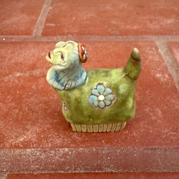 Green teenie w Daisies, Red Hat and Blue Hair by Nell Eakin