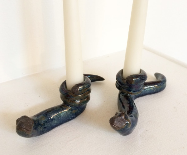 Dark blue slithering snake candle holders by Nell Eakin