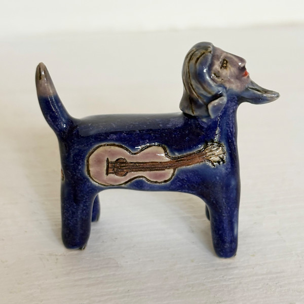 Sharp Blue Guitar Man,  a teenie by Nell Eakin