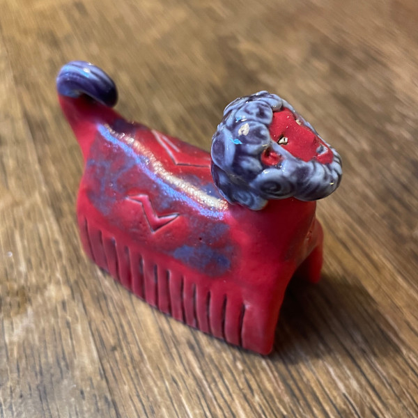 Bearded Red  Caterpillar w Lightning Bolt & Purple Glow, a teenie by Nell Eakin