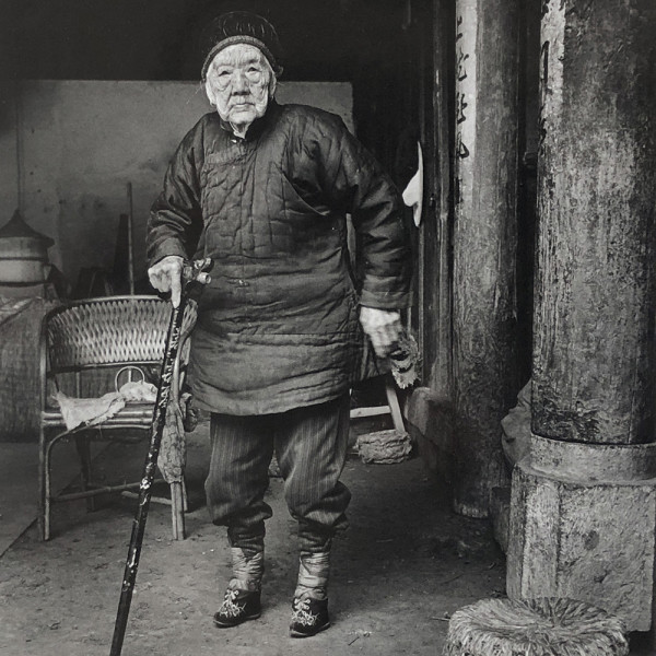 Standing by Li Nan