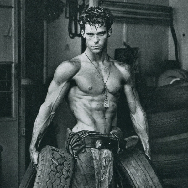 Fred With Tires 1984 by Herb Ritts