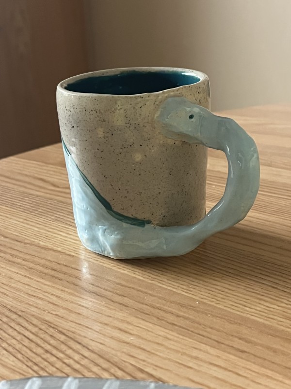 Dino Mug by Elliot Silmon