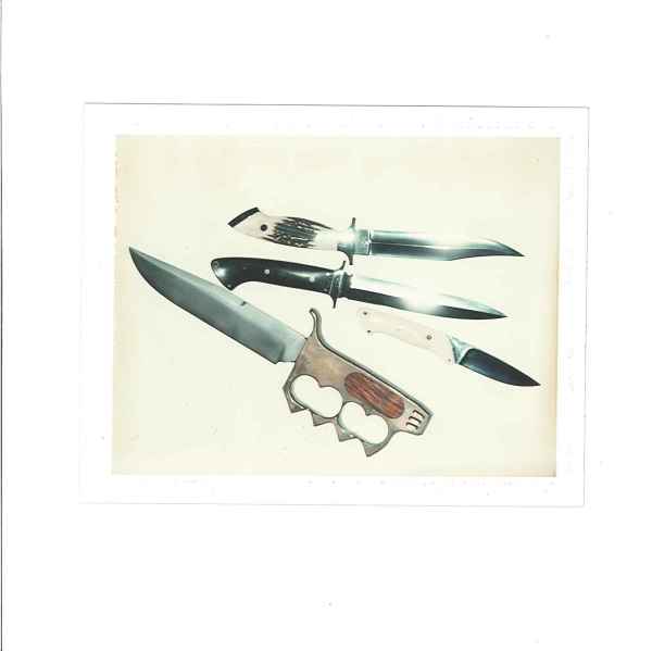 Knives
Valentino and Unidentified Woman, 8/1975 by Andy Warhol