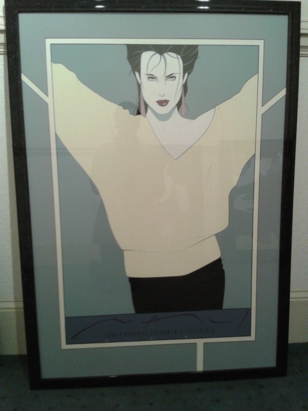 Female Portraite in Yellow Sweater by Patrick Nagel