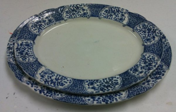 2 Blue and White Platters by Maker Unknown