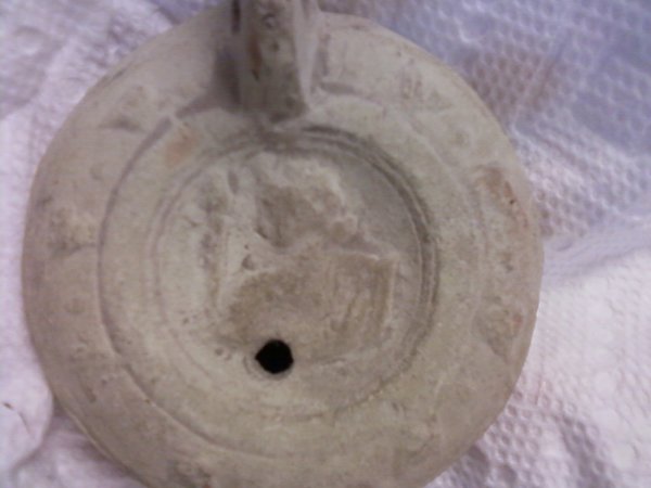 Roman Oil Lamp with Handle and Woman with Torch Relief by Unknown