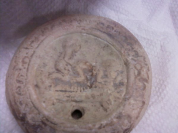 Roman Clay Oil Lamp with Raised Sex Scene by Unknown