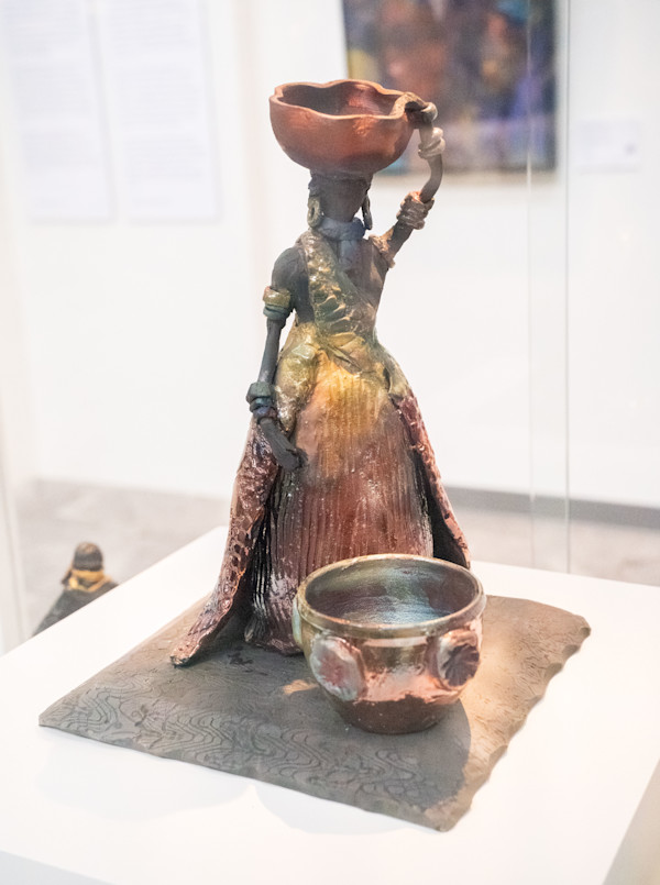 Woman with Basket by Yvonne Stubbs