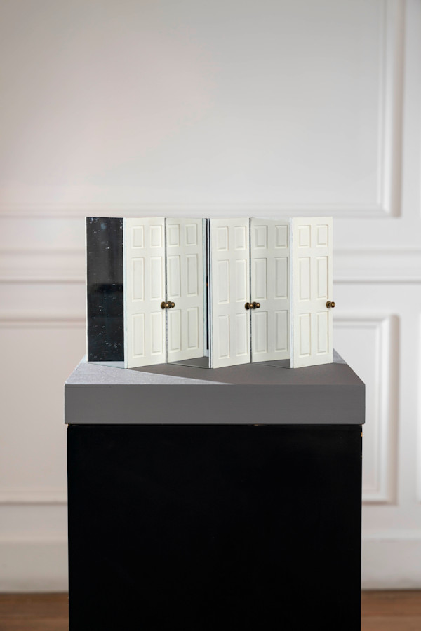 Reflective journey mini sculpture by Shirin Abedinirad