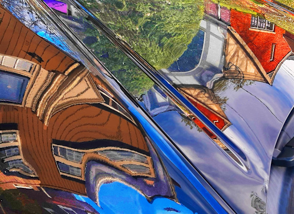 The World's Reflection in a Car by tSOfi Inbar