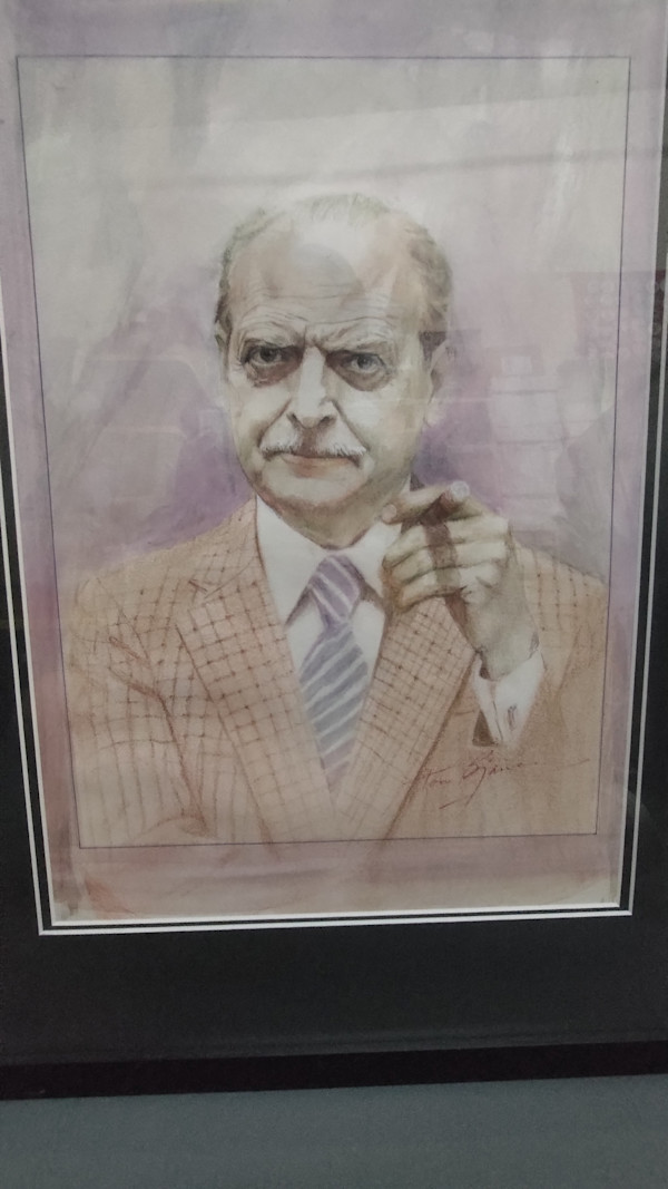 Portrait of a man with a cigar by Tom Bjarnason