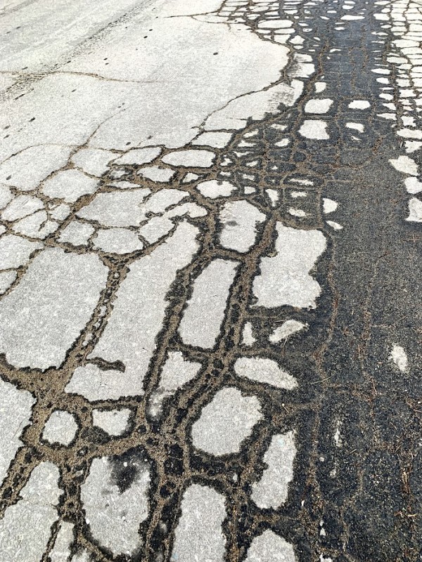 Cracked Asphalt by Anat Ambar