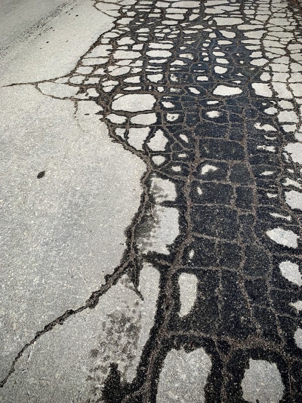 Cracked Asphalt by Anat Ambar