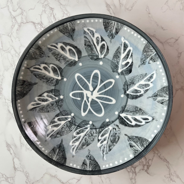 Low/wide bowl in Arctic Blue with leaves and swirls by Kristin Bernhardt Conrad