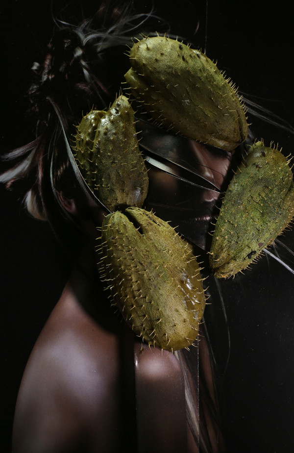 Woman with chayote by Alex Guerra
