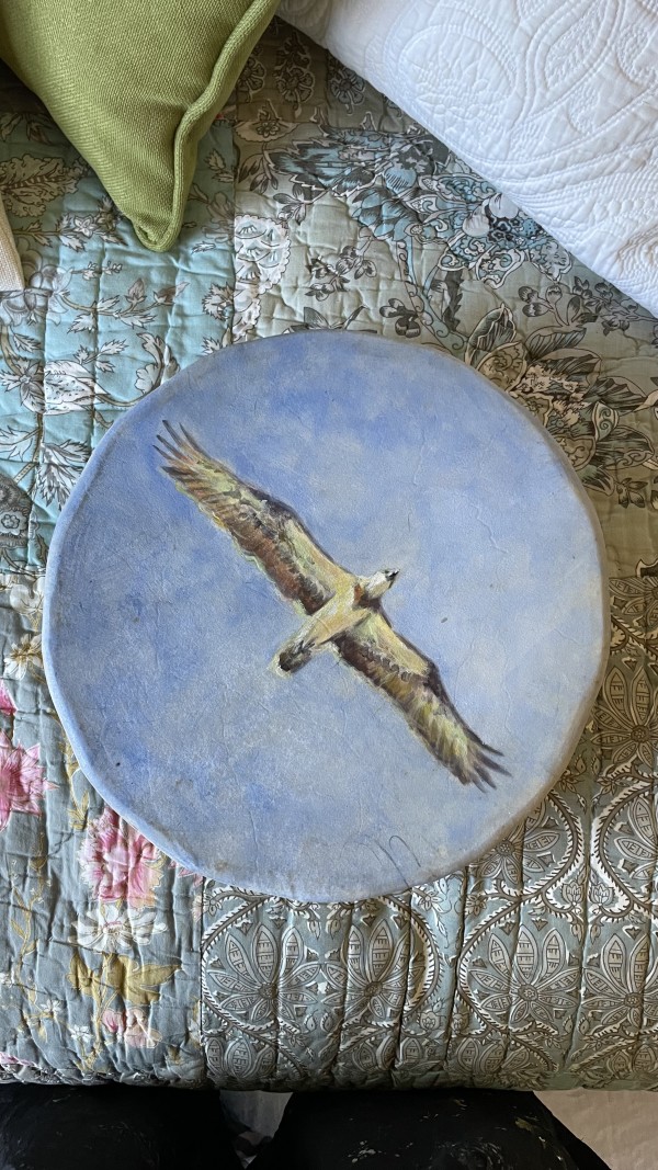 Eagle, offspring on drum by Jeannina Blanco