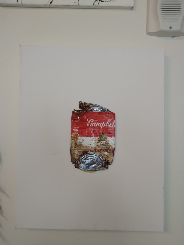 Smashed Campbell's soup can by Cesar Alexis Gonzalez