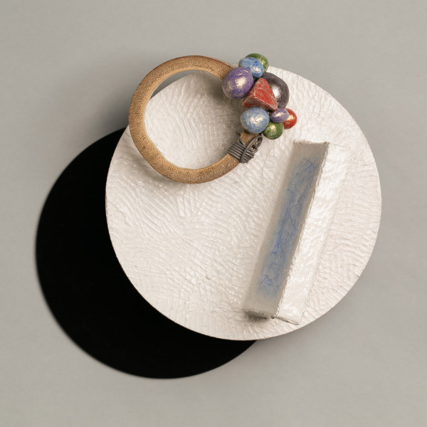 Wall Device for pretending to be wealthy enough to get to the other side by Charles H. Stinson