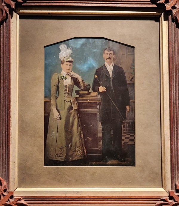 Elegant couple with studio backdrop