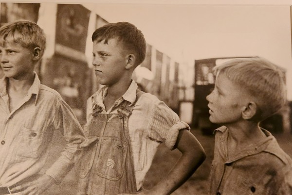 Boys at sideshow by Eudora Welty