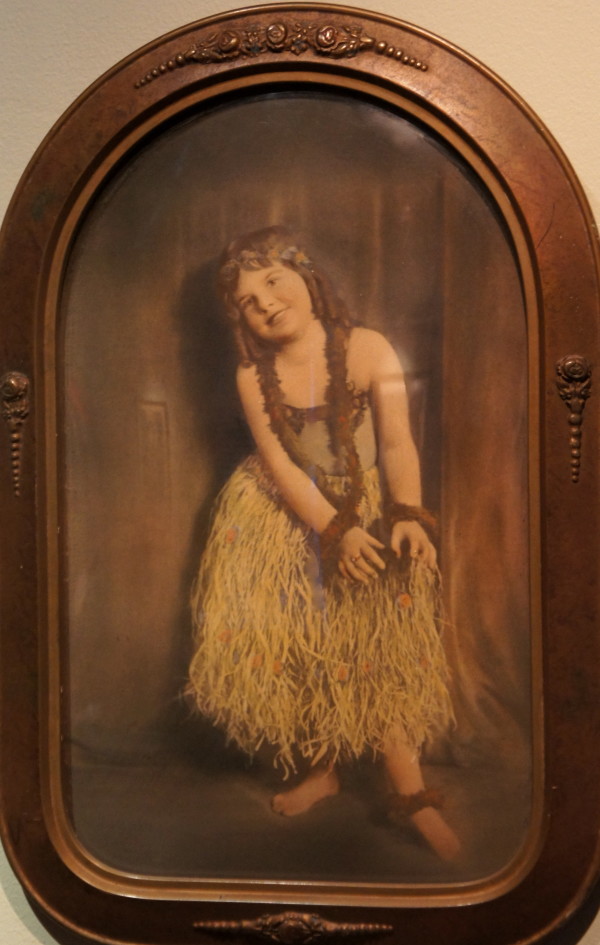 Young girl in grass skirt