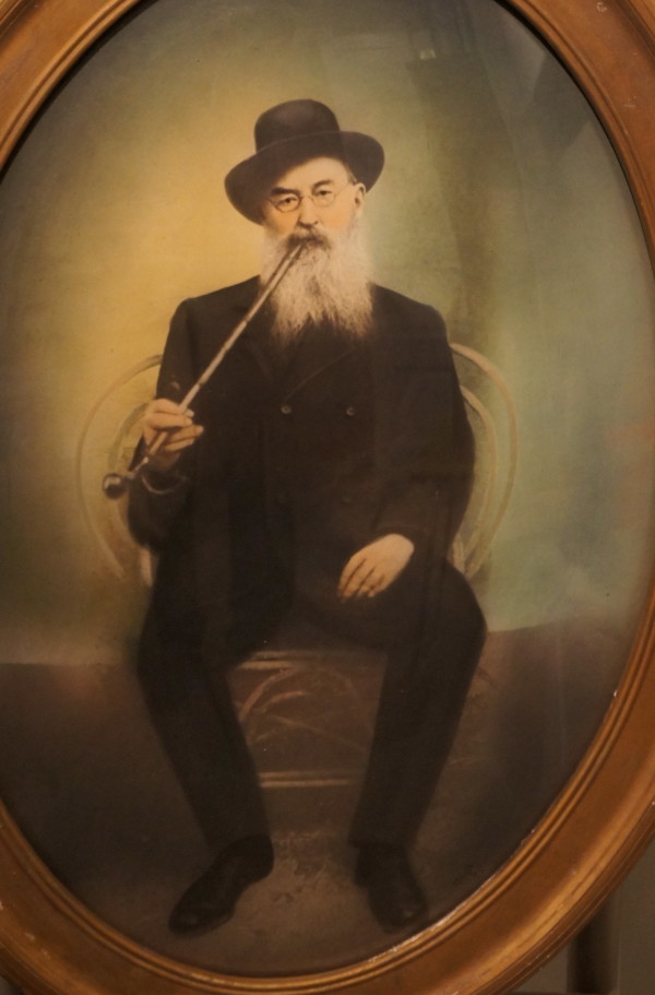 Seated gentleman with pipe