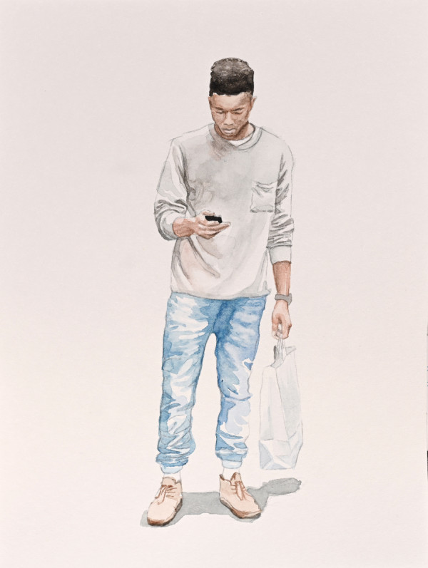 Man looking at phone by Julia Wolinsky