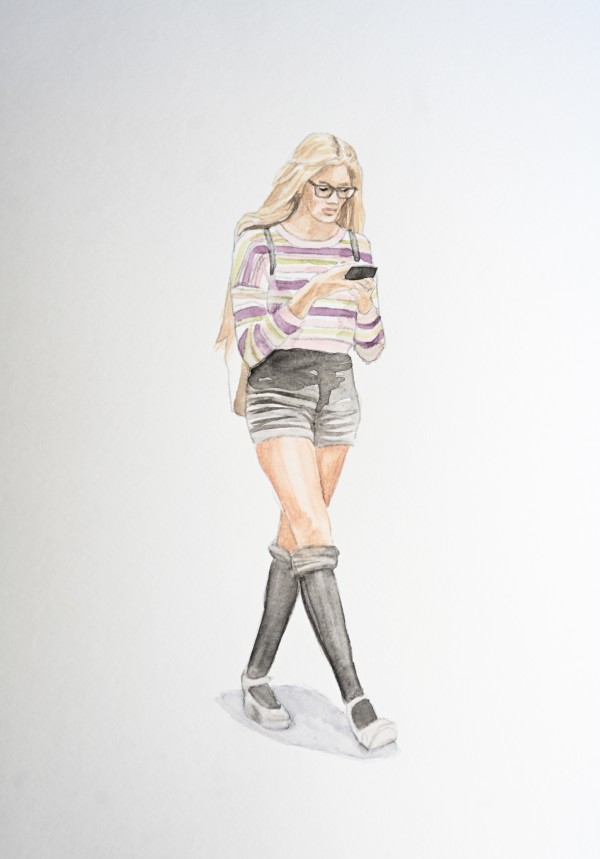 Woman in sweater looking at phone by Julia Wolinsky