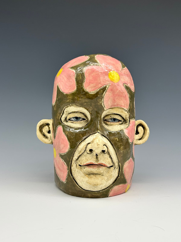 Pink flowers on green cap by Jeanine Pennell
