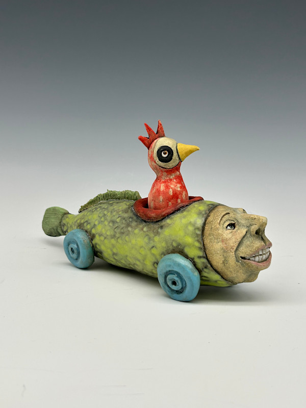 Rooster in a chartreuse fish car by Jeanine Pennell