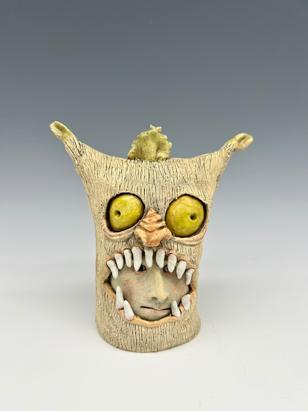 Yellow eyed monster by Jeanine Pennell