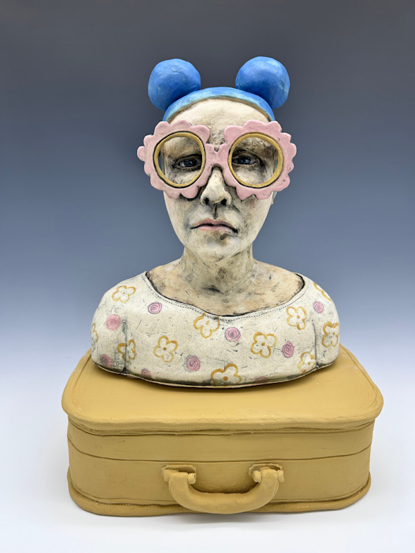 she wore rose colored glasses (and brought her baggage with her) by Jeanine Pennell