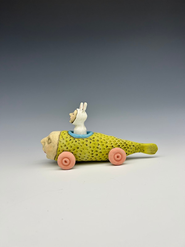 Happy minnow with a white bunny by Jeanine Pennell, Image 1.