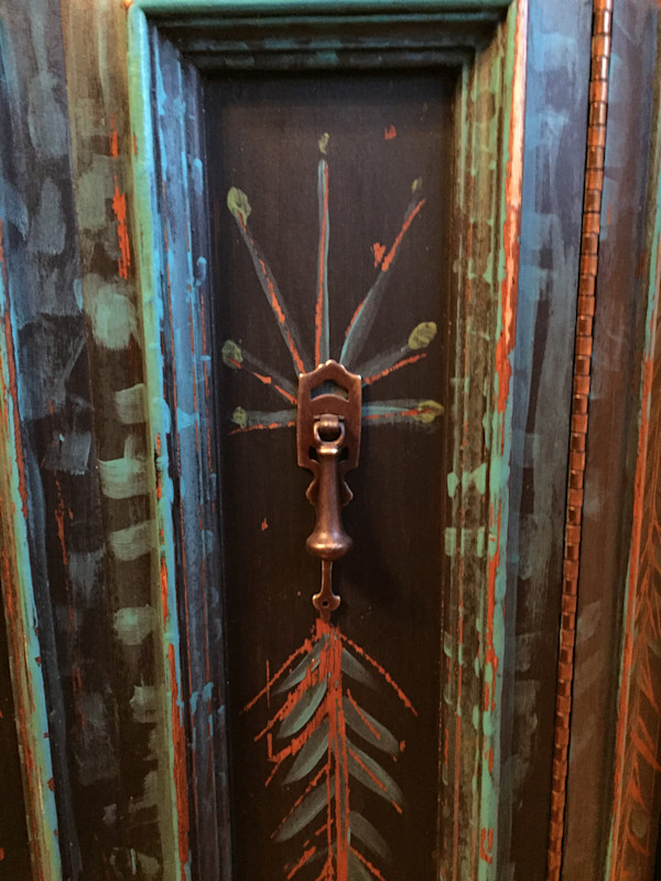 Painted cabinet door, detail photograph. by Denita Benyshek
