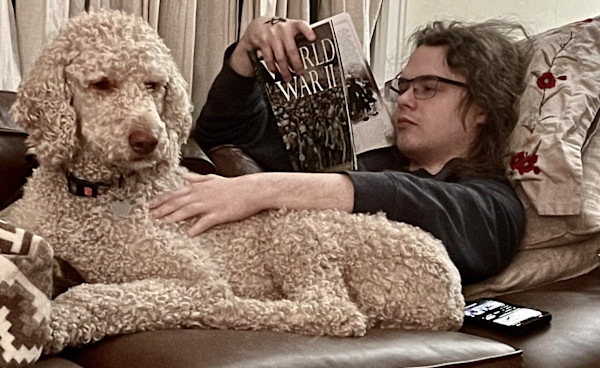 My Son reading with loyal Buzz, 2 by Denita Benyshek