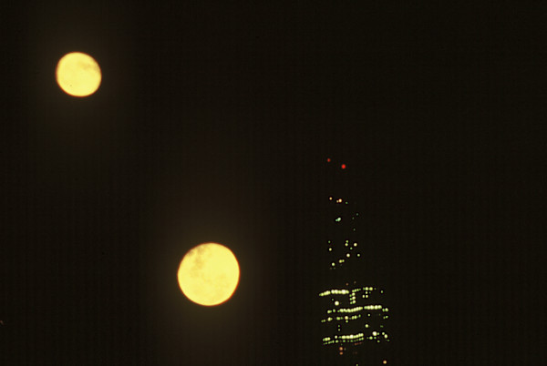 TWO  MOONS OVER SEARS TOWER by charles elwert