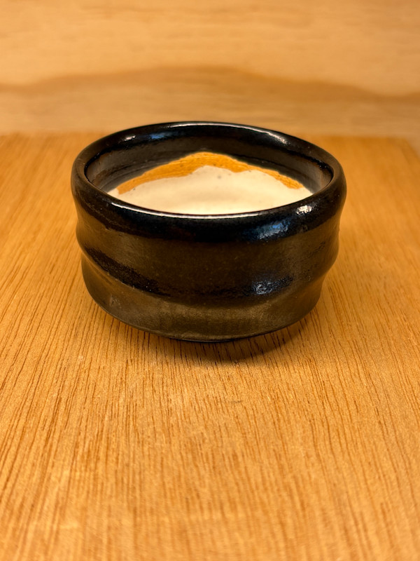 Sake Cup (Guinomi), Black with white interior by Marianne Wilson Studio, Image 1.